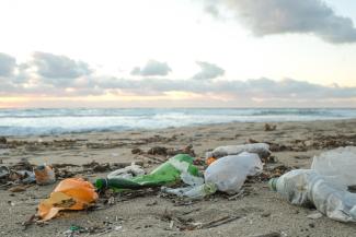 A beach with litter all over